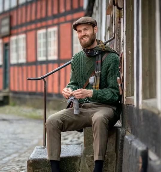 Foredrag . Den vandrende Strikker